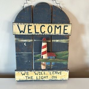 Rustic wood sailing sign